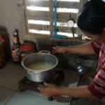ThatOun Kom cooks on biogas