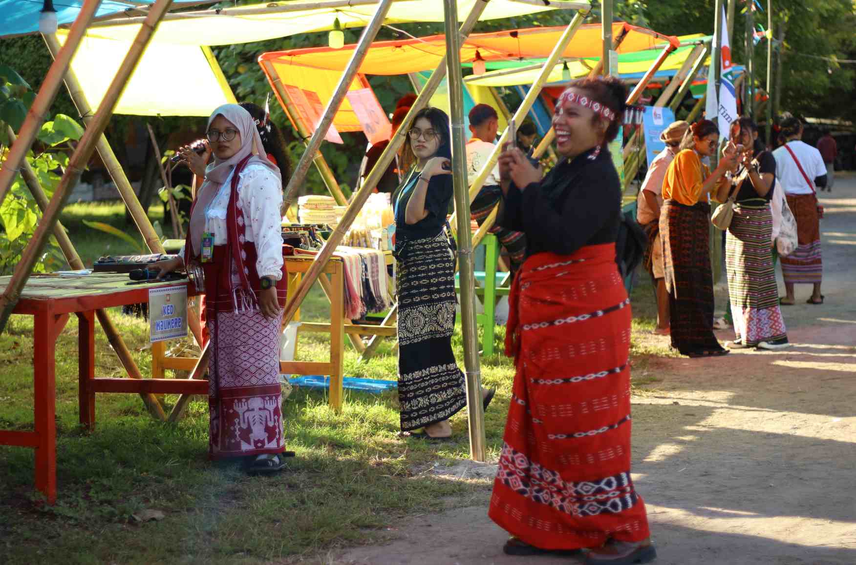 Eda in traditional clothing during an NLGF-funded event