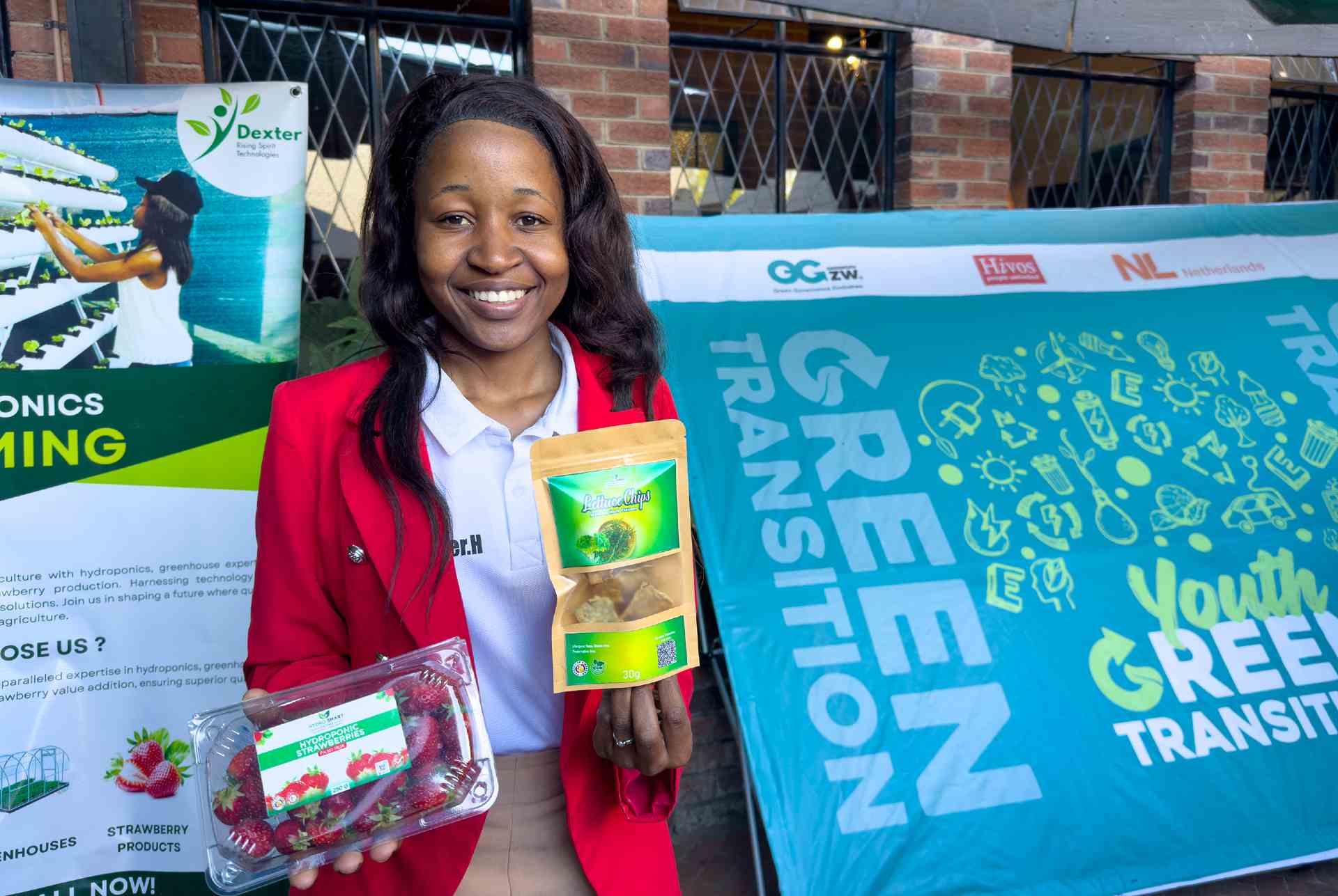 A participant showcasing their products at the symposium